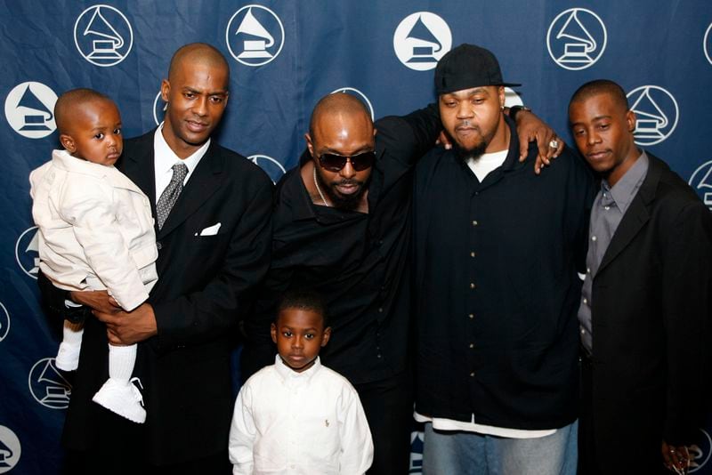 Rico Wade (from left), Patrick "Sleepy" Brown, artist Big Rube and Raymond Murray pose on the red carpet at the Atlanta Chapter Recording Academy Honors at the Westin Peachtree Plaza in Atlanta on April 26, 2007. Wade, Brown and Murray were being honored at the event. (Mikki K. Harris / AJC STAFF)