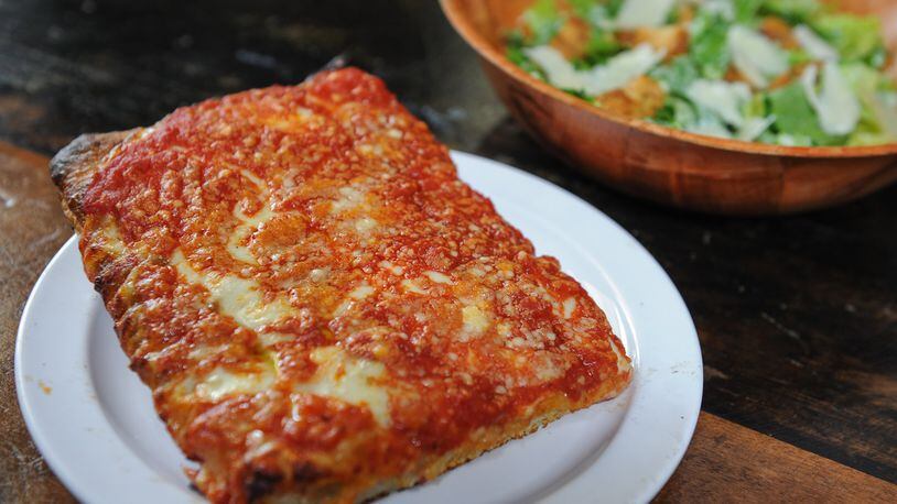 Brooklyn Sicilian slice and caesar salad at O4W Pizza. (BECKY STEIN PHOTOGRAPHY)