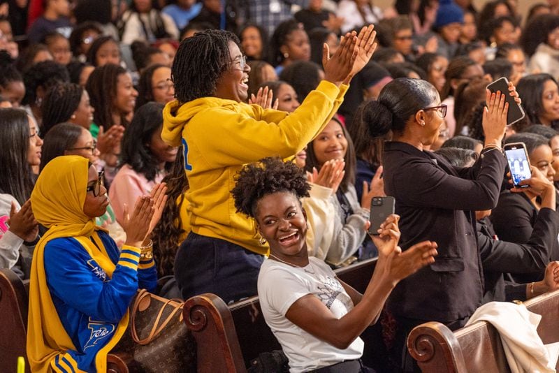 Students cheer during a ceremony announcing a $100 million gift at Spelman College in Atlanta on Thursday, January 18, 2024. It’s the largest single donation to any historically Black college or university. (Arvin Temkar / arvin.temkar@ajc.com)