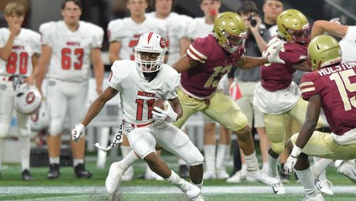 North Gwinnett wide receiver Josh Downs (11) makes a move after a catch in the second half of the Corky Kell Classic   Saturday, Aug. 18, 2018, at Mercedes-Benz Stadium in Atlanta. North Gwinnett won, 37-2, over Brookwood.