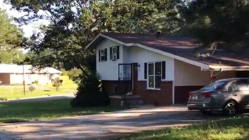 Police said three children were found in this house in southwest Atlanta, as well as a 21-year-old man who appeared malnourished. (Credit: Channel 2 Action News)