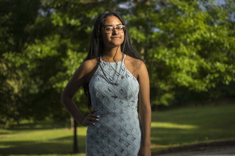 Marisela, shown at Benteen Park in Atlanta, will attend Harvard on full scholarship in August. She is the first in her family to attend a four-year university. ALYSSA POINTER/ATLANTA JOURNAL-CONSTITUTION