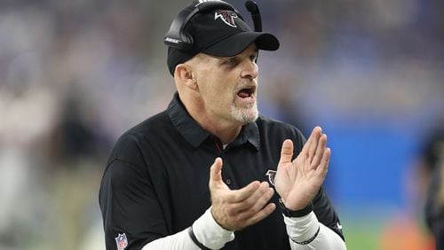 Falcons head football coach Dan Quinn watches the action during Sunday's  game against the Lions at Ford Field on in Detroit.