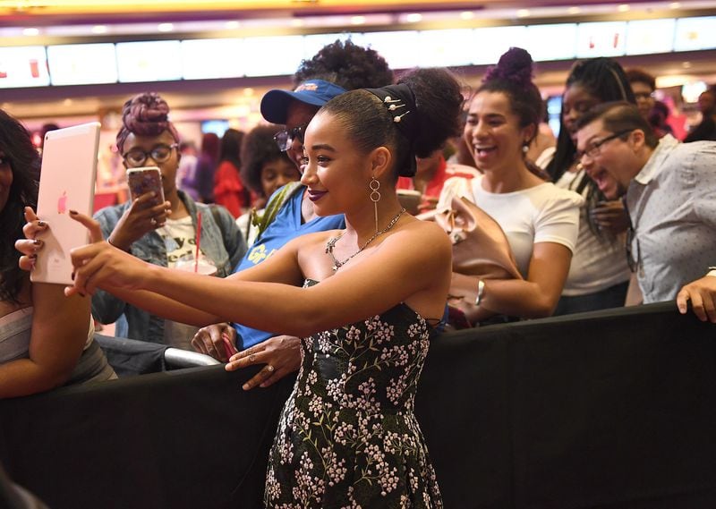 Actress Amandla Stenberg pose with fans at “The Hate U Give” Atlanta red carpet screening at Regal Atlantic Station on Oct. 3. PARAS GRIFFIN / GETTY IMAGES