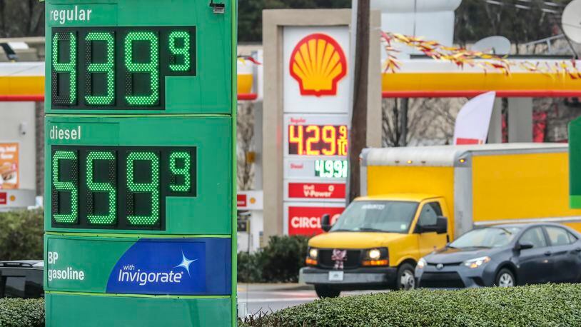 Gas prices in metro Atlanta hit record highs this past week as part of the fallout from Russia's unprovoked invasion of Ukraine. Georgia officials at the state and national level pursued ways to suspend gas taxes to ease the burden on consumers. (John Spink / John.Spink@ajc.com)