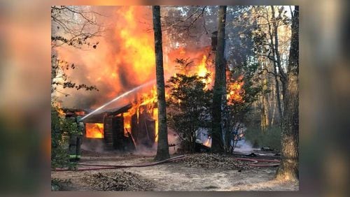 One woman was killed Saturday morning when a wood cabin caught fire in northeast Georgia, authorities said.