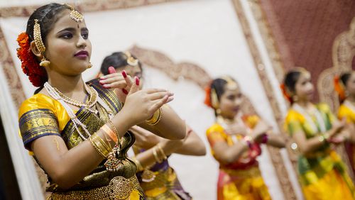 Srija Vanam (left) dances during the 17th annual Festival of India at the Gwinnett Center in Duluth on Saturday, August 24, 2013. Sponsored by the India American Cultural Association and and other Indian community organizations, the festival included food, art and craft vendors, speakers on Indian culture and a dance and talent competition. JONATHAN PHILLIPS / SPECIAL