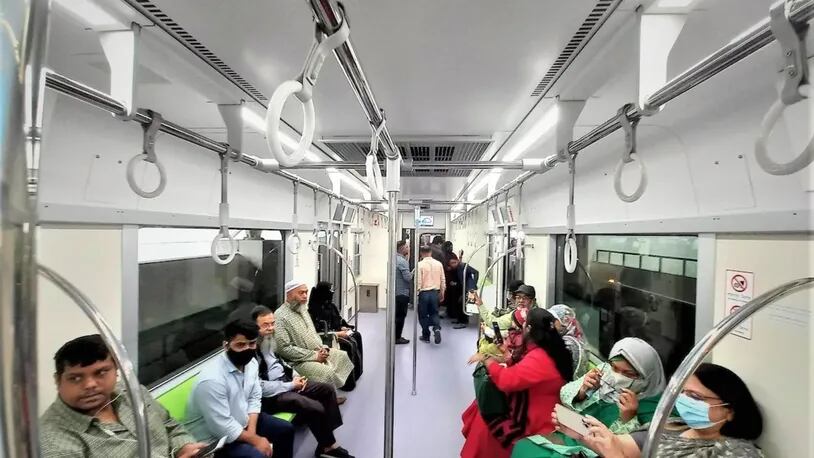 Passengers ride the new metro rail in Dhaka, Bangladesh, February 1, 2023. Thomson Reuters Foundation/Md. Tahmid Zami