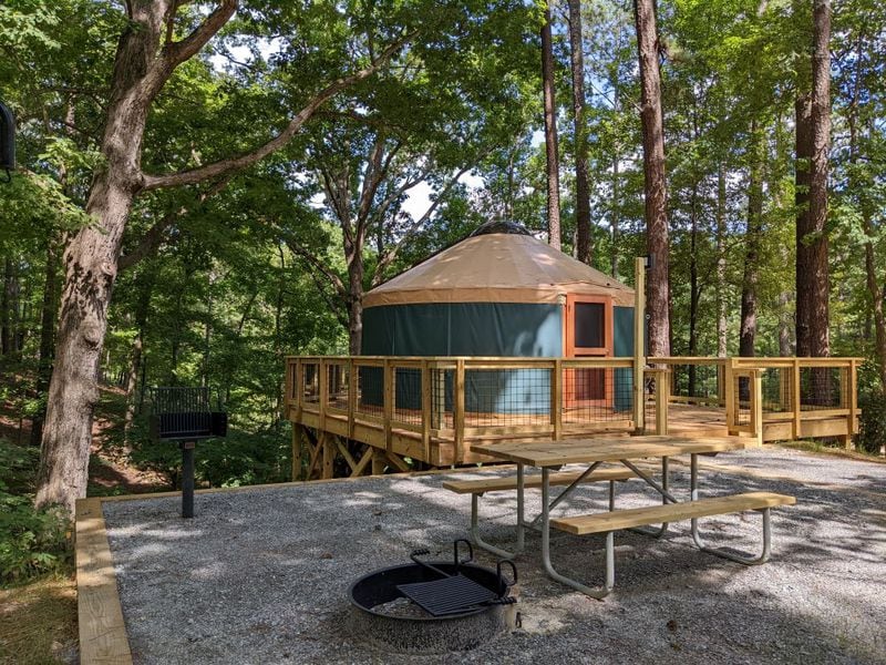Red Top Mountain State Park has yurts. This one has a grill and picnic table outside.