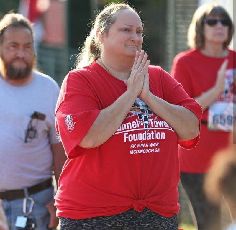 A woman is overcome with emotion at the Tunnel to Towers race in McDonough.
Photo courtesy of Tunnel to Towers/ Brandon Abernathy of 3 Cent Media Ventures LLC.