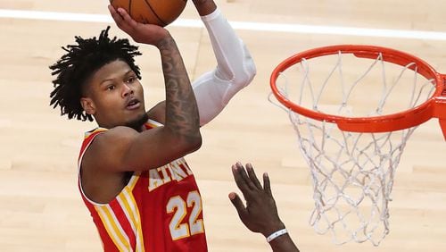 The Hawks' Cam Reddish shoots for two against the Brooklyn Nets on Jan. 27, 2021.    Curtis Compton / Curtis.Compton@ajc.com”