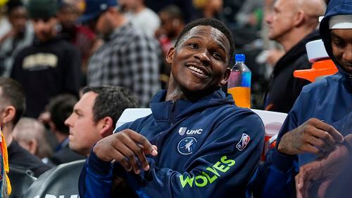 Minnesota Timberwolves guard Anthony Edwards sits in the bench after he was pulled from the floor late in the second half of Game 2 of an NBA basketball second-round playoff series against the Denver Nuggets Monday, May 6, 2024, in Denver. (AP Photo/David Zalubowski)