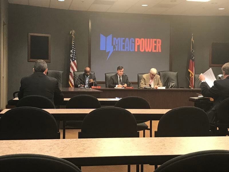MEAG board members prepare for vote. LEFT TO RIGHT: L. Tim Houston Sr, James Fuller (MEAG CEO) and Steve Tumlin. The board unanimously voted to support continued expansion of nuclear plant Vogtle.