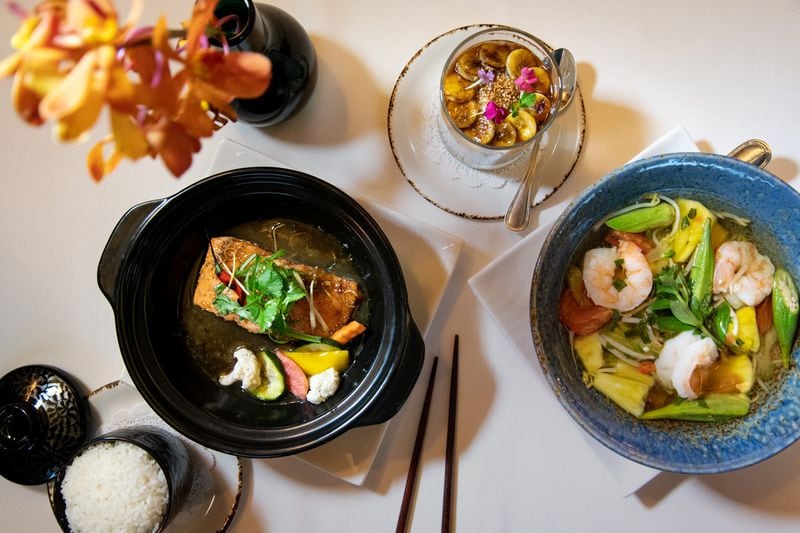 A three-course Vietnamese meal from chef Nicole Routhier includes Salmon Braised in Ginger Caramel Sauce with Pickled Vegetables, served with rice; Banana Tapioca Pudding; and Spicy and Sour Shrimp Soup with Pineapple. STYLING BY NICOLE ROUTHIER / CONTRIBUTED BY MIA YAKEL
