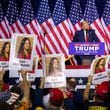 Republican presidential candidate and former president Donald Trump speaks about slain nursing student Laken Riley during a rally at Forum River Center in Rome on Saturday, March 9, 2024, as supporters hold up signs with her photo. (Arvin Temkar / arvin.temkar@ajc.com)