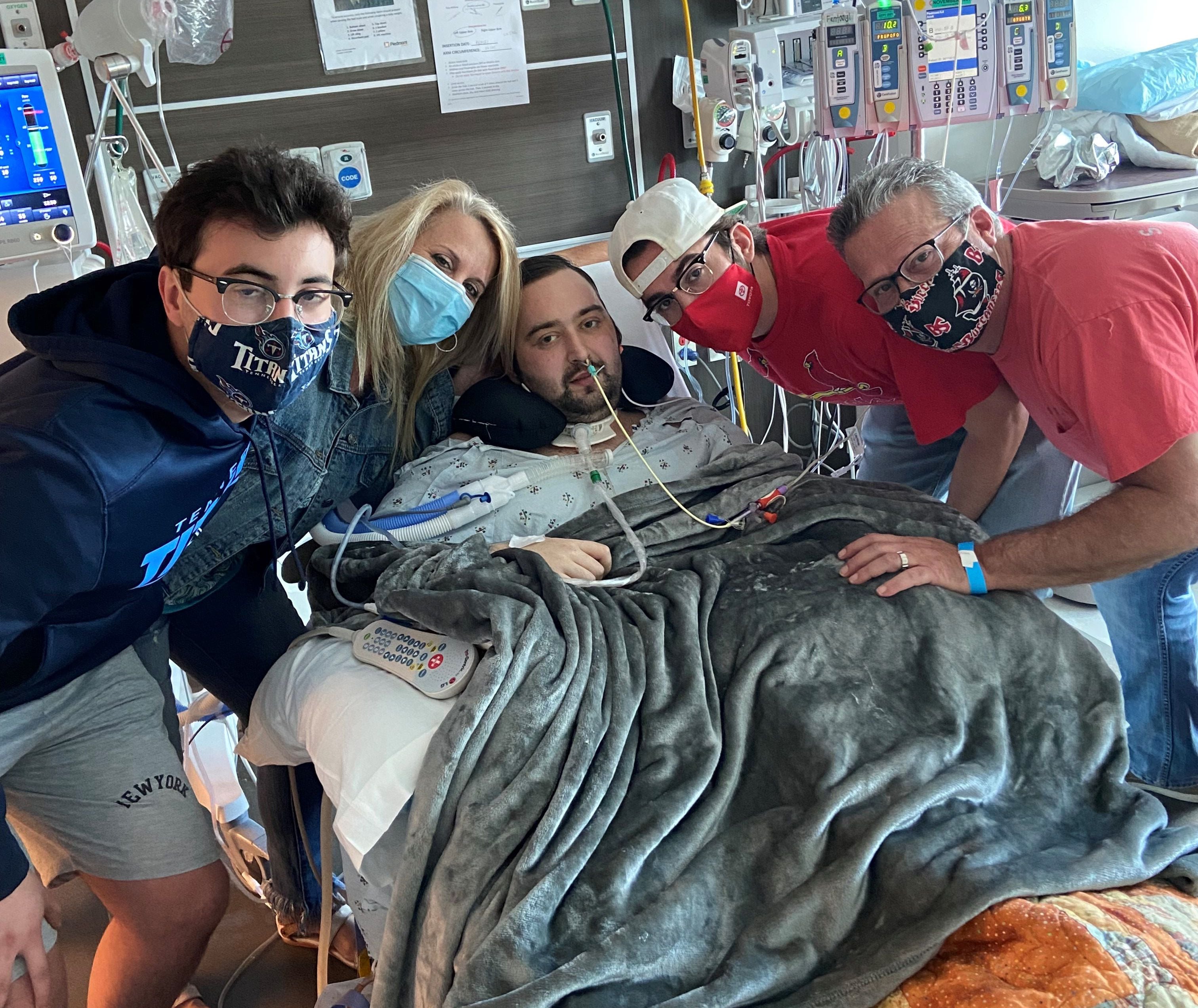 Blake Bargatze received a visit at Piedmont Hospital in late May from his family, from left: brother Wesley Bargatze, mother Cheryl Nuclo, brother Ross Bargatze and stepfather Paul Nuclo.