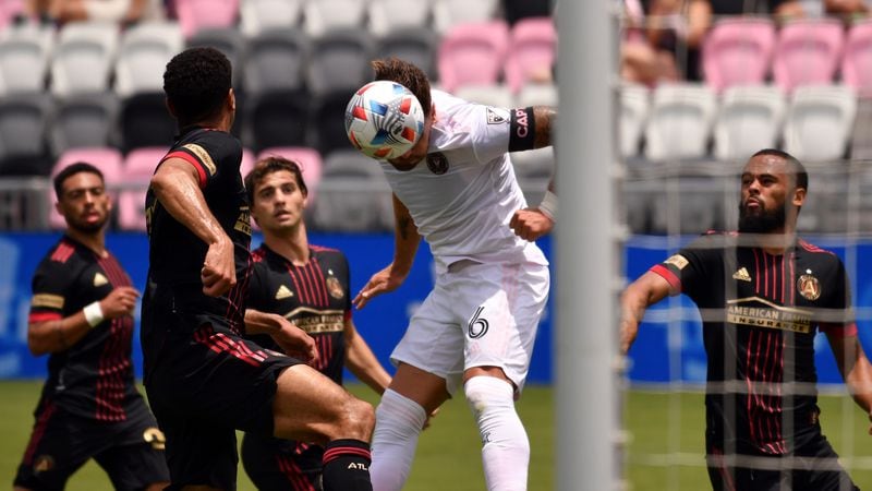 Inter Miami defender Leandro Gonzalez Pirez (6) heads the ball as Atlanta United defenders look on during the first half Sunday, May 9, 2021, in Fort Lauderdale, Fla. (Jim Rassol/AP)