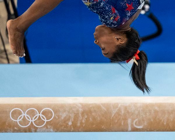 Simone Biles, of the United States, competes on the balance beam at the delayed 2020 Olympics in Tokyo, July 25, 2021. (Doug Mills/The New York Times)