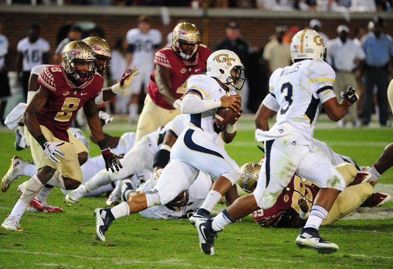 ATLANTA, GA - OCTOBER 24: Justin Thomas #5 of the Georgia Tech Yellow Jackets carries the ball for a 60 yard touchdown against the Florida State Seminoles on October 24, 2015 at Bobby Dodd Stadium in Atlanta, Georgia. Photo by Scott Cunningham/Getty Images)