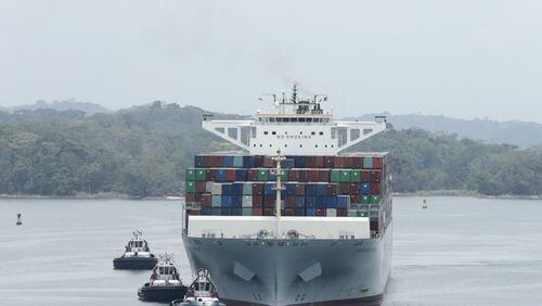 The Neopanamax Cosco Development cargo ship sails in Gatun Lake as it lines up to make it through Agua Clara locks on the newly expanded Canal in, Panama, Tuesday, May, 2, 2017.
