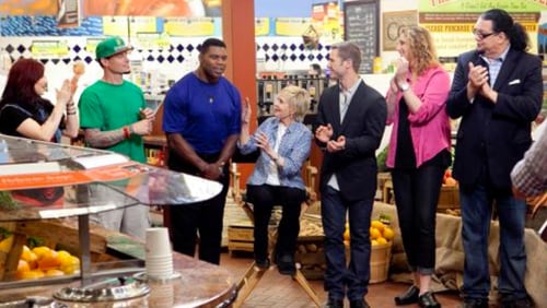 Herschel Walker and Florence Henderson at the center of the action on the Food Network show "Rachael vs. Guy: Celebrity Cook-Off." Photo: Food Network.