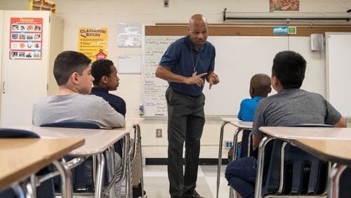 Studies show pay is one of many factors that cause teacher turnover. (AJC FILE PHOTO)