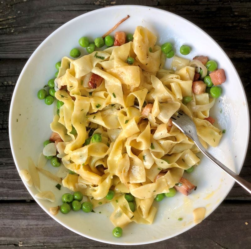 A Mano’s carbonara is made with tagliatelle, pancetta, grana, peas and a farm egg. CONTRIBUTED BY WENDELL BROCK
