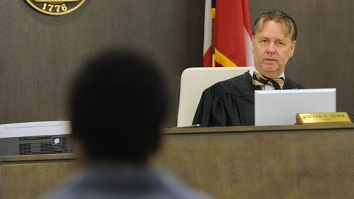 Clayton County Juvenile Court Judge Steve Teske speaks with a defendant. AJC file photo
