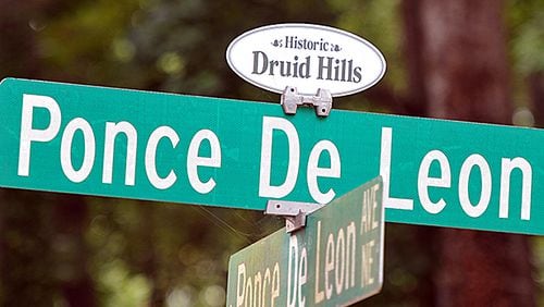 July 31, 2014 Atlanta - Picture shows street signs near Dellwood Park in Historic Druid Hills on Thursday, July 31, 2014. Druid Hills residents are considering annexing themselves into the city of Atlanta, which would be a major expansion for the city affecting its educational system, tax base and racial makeup. HYOSUB SHIN / HSHIN@AJC.COM