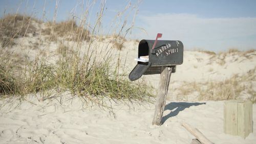 It’s a mile and a half walk to get to the Kindred Spirit mailbox, originally set up as a way for lovers to communicate over 40 years ago on Sunset Beach. Visitors continue to drop off heartfelt messages about love and hope. CONTRIBUTED BY WWW.VISITNC.COM