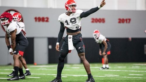 The Georgia Bulldogs really like what they've seen from senior Adam Anderson (19), not only as an outside linebacker but also as a defensive back lining up at the star position. (Photo by Tony Walsh/UGA Athletics)