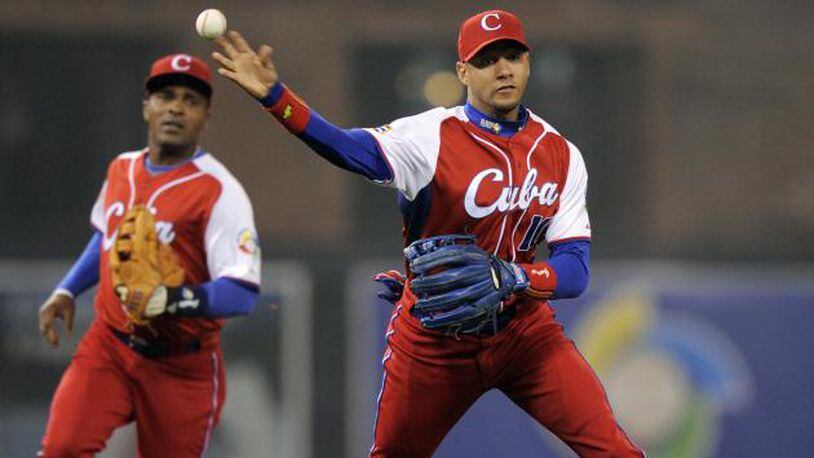 The Braves hope to sign Cuban free agent Hector Olivera, an immediate-impact type player who would likely become thier starting second baseman for now and possibly move to third base in the future. (AP photo)