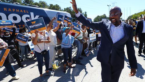 092622 Atlanta: Senator Reverend Raphael Warnock waves to supporters as he arrives for a campaign stop at Cascade Family Skating on Monday, Sept. 26, 2022, in Atlanta.   “Curtis Compton / Curtis Compton@ajc.com