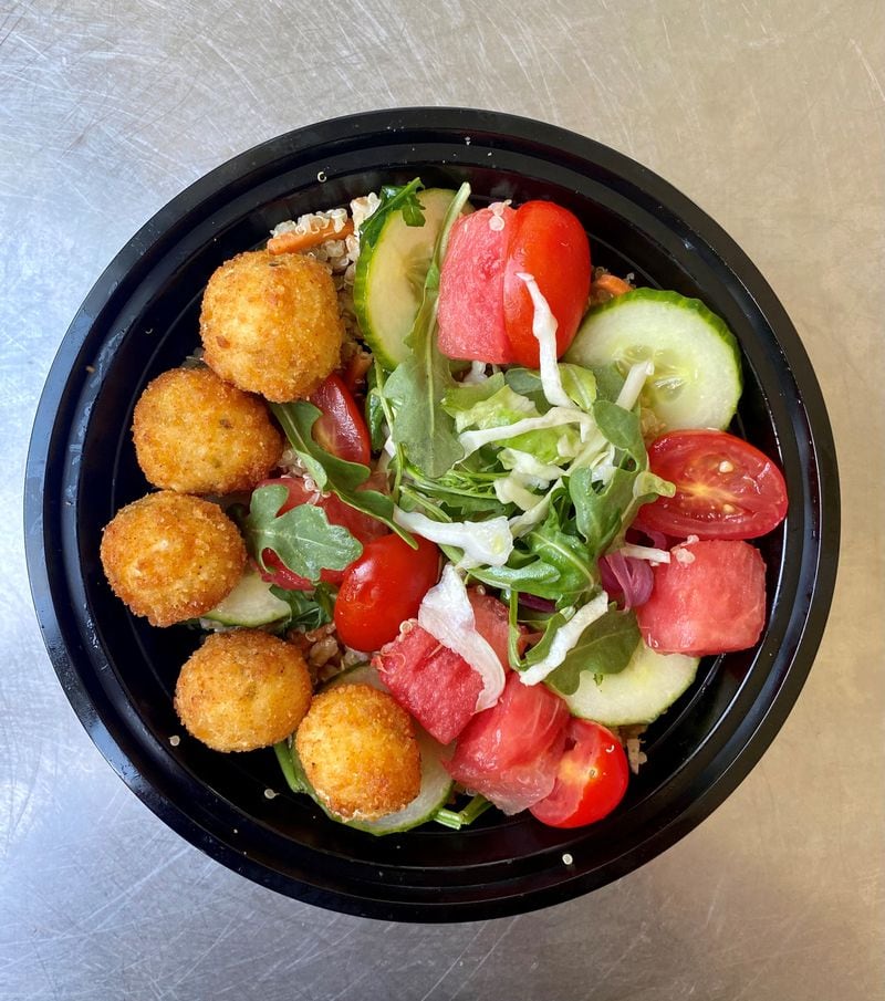 This watermelon and fried goat cheese salad is from the “midday mood” side of the menu of Poach Social, which recently opened in Summerhill. Wendell Brock for The Atlanta Journal-Constitution