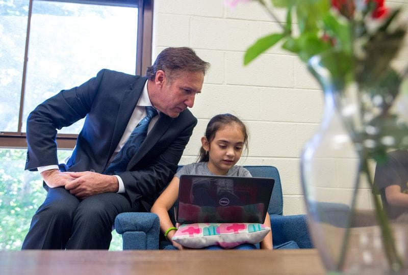 Fulton County Schools Superintendent Mike Looney speaks with Karolina, 9, as he tours Evoline C. West Elementary School on Thursday, June 13, 2019. Looney’s first official day on the job was Monday, June 17. CASEY SYKES FOR THE ATLANTA JOURNAL-CONSTITUTION