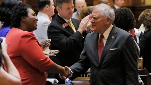 Gov. Nathan Deal is greeted by then-House Minority Leader Stacey Abrams, in this 2017 file photo. BOB ANDRES /BANDRES@AJC.COM