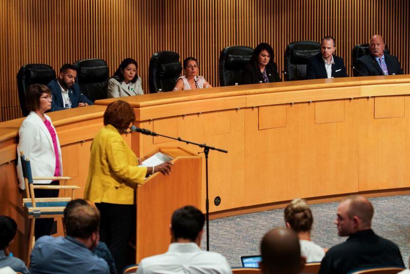 A panel of speakers who both support and oppose Gwinnett County's participation in a controversial ICE program are seen during a community engagement discussion on immigration organized by Gwinnett Commissioner Marlene Fosque at the Gwinnett Justice and Administration Center on Wednesday, July 31, 2019, in Lawrenceville. ELIJAH NOUVELAGE/SPECIAL TO THE AJC