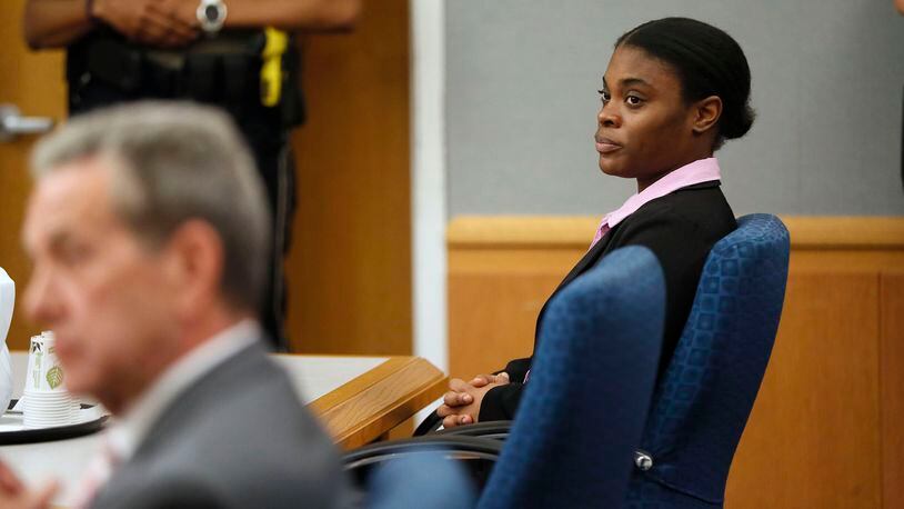 April 30, 2019 - Lawrenceville - Tiffany Moss watches as the jury is polled about the verdict.  The jury in the Tiffany Moss murder trial today sentenced her to death after they found Moss, who is representing herself, guilty of intentionally starving her 10-year-old stepdaughter Emani to death in the fall of 2013, in addition to other charges. The prosecution is asking for the death penalty.   Bob Andres / bandres@ajc.com