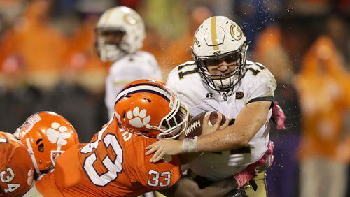 CLEMSON, SC - OCTOBER 28:  Matthew Jordan #11 of the Georgia Tech Yellow Jackets is hit by J.D. Davis #33 of the Clemson Tigers during their game at Memorial Stadium on October 28, 2017 in Clemson, South Carolina.  (Photo by Streeter Lecka/Getty Images)