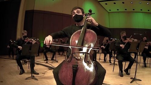 In keeping with many other entertainment and arts venues, the Atlanta Symphony Orchestra announced Monday it would require all audiences to offer proof of vaccination against COVID-19, or to present a recent negative test for the disease. Here principal cellist Rainer Eudeikis performs in a mask. Audience members will also be required to wear face coverings. Photo: courtesy Atlanta Symphony Orchestra
