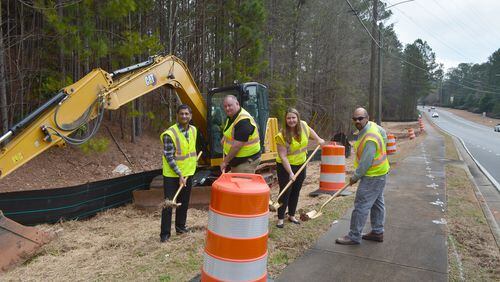 Johns Creek staff recently broke ground on the Autrey Mill Middle School right-turn lane extension project. COURTESY CITY OF JOHNS CREEK