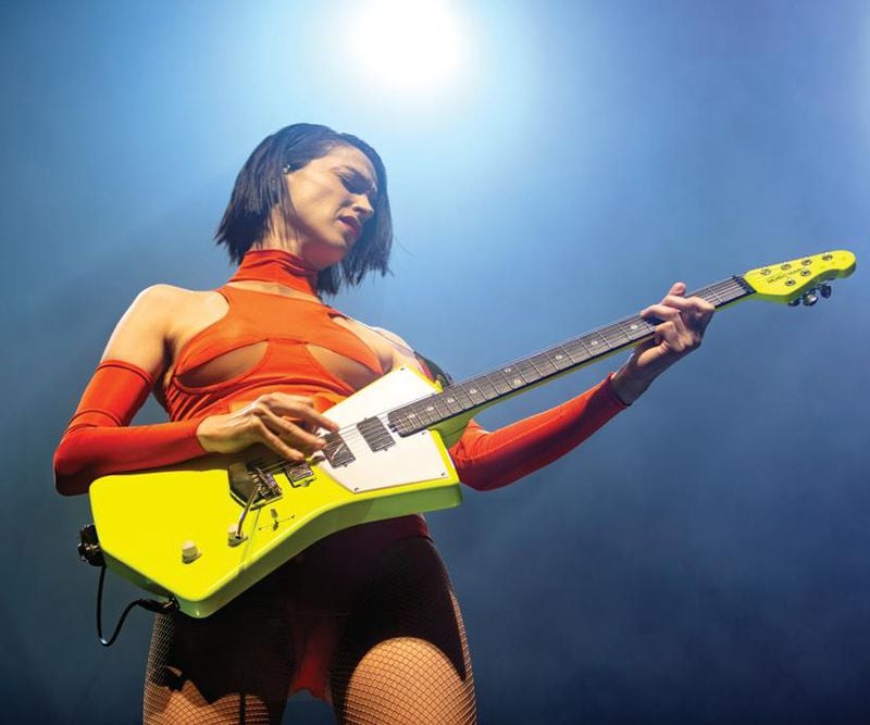 Annie Clark (aka St. Vincent) plays the Ernie Ball Music Man signature guitar that was designed especially for her. It will be part of the Museum of Design Atlanta "Wood & WIre" exhibition.
