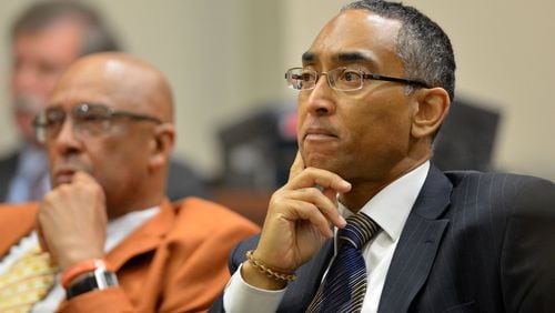 Suspended DeKalb County CEO Burrell Ellis listens to testimony from District Attorney Robert James during a hearing in DeKalb County Superior Court Thursday, January 23, 2014.