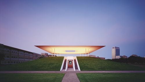 “Skyspace,” an installation on the Rice University campus in Houston, uses light and the sky above to evoke an otherworldly experience. It was created by artist James Turrell, and is sometimes used as a musical performance space. Participants gather under the open-roofed structure at dawn and twilight. CONTRIBUTED BY FLORIAN HOLZHERR