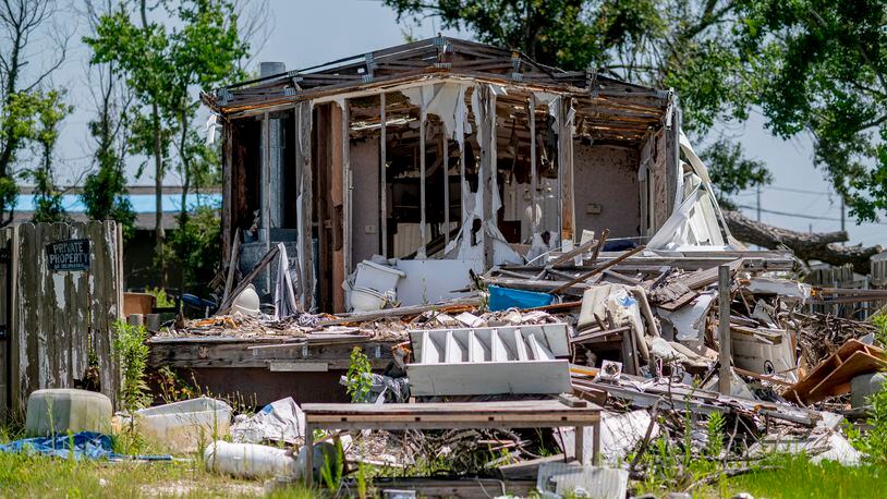 A destroyed home in Lake Charles, La., on Saturday, July 24, 2021. The city has struggled to rebuild after it has been hit by one natural disaster after another in the past year. (Emily Kask/The New York Times)