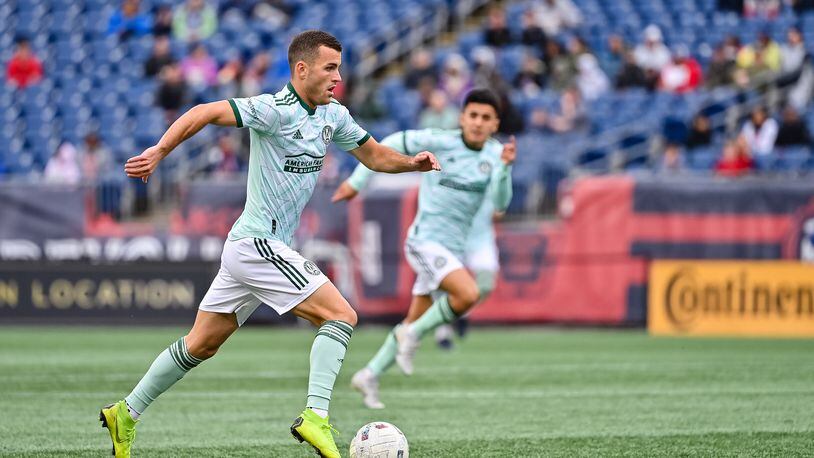 Atlanta United defender Brooks Lennon #11 dribbles during the first half of the match against New England Revolution at Gillette Stadium in Foxborough, United States on Saturday October 1, 2022. (Photo by Dakota Williams/Atlanta United)
