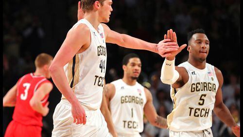 Georgia Tech center Ben Lammers and freshman guard Josh Okogie, here celebrating after a basket against Belmont in the NIT, both will return to the Jackets next season. (Curtis Compton/ccompton@ajc.com)