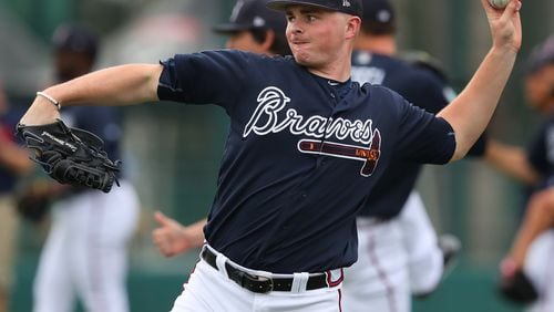 Braves 6-foot-5, 255-pound prospect Sean Newcomb reported to camp in much-improved condition this spring. (Curtis Compton/ccompton@ajc.com)