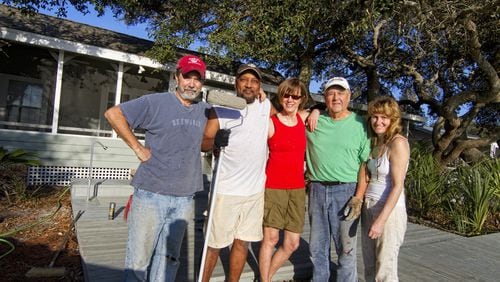 Billy Howard and Laurie Shock joined with friends and family to buy and renovate a 100-year-old home near Mexico Beach in Florida. Pictured in the photo, right to left are Shock, her father Mike Shock, Pam Wuichet, J.D. Scott and Howard. SPECIAL