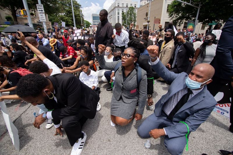 Marchers kneel near the Capitol during a march in honor of George Floyd's funeral  on Thursday, June 4, 2020, in Atlanta. (Photo: Steve Schaefer for The Atlanta Journal-Constitution)